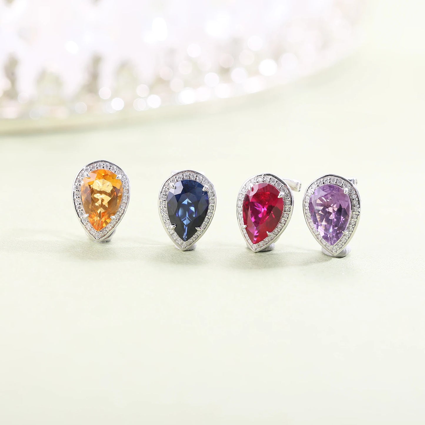 Check Out Our Mobile Watch Price, Tiger Element Pear Shape Blue Sapphire Stud Earrings