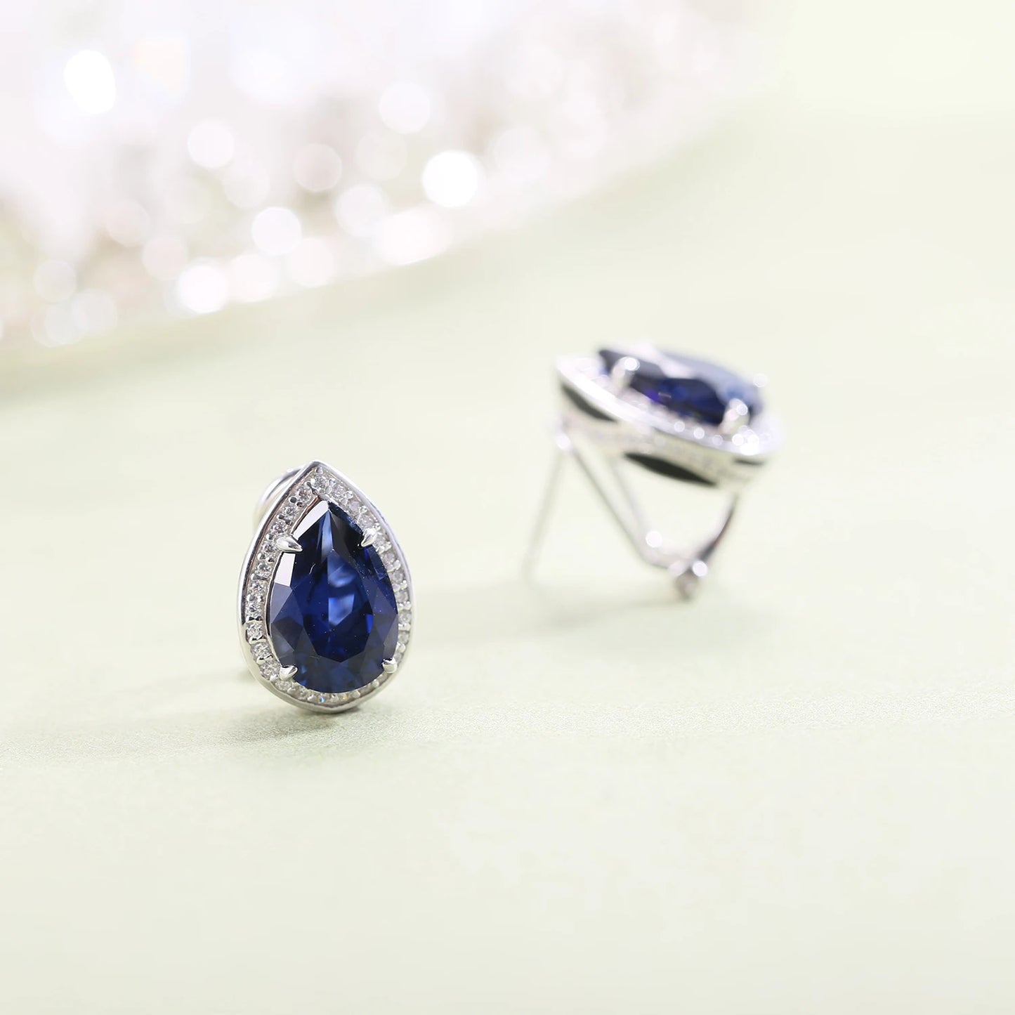 Check Out Our Mobile Watch Price, Tiger Element Pear Shape Blue Sapphire Stud Earrings